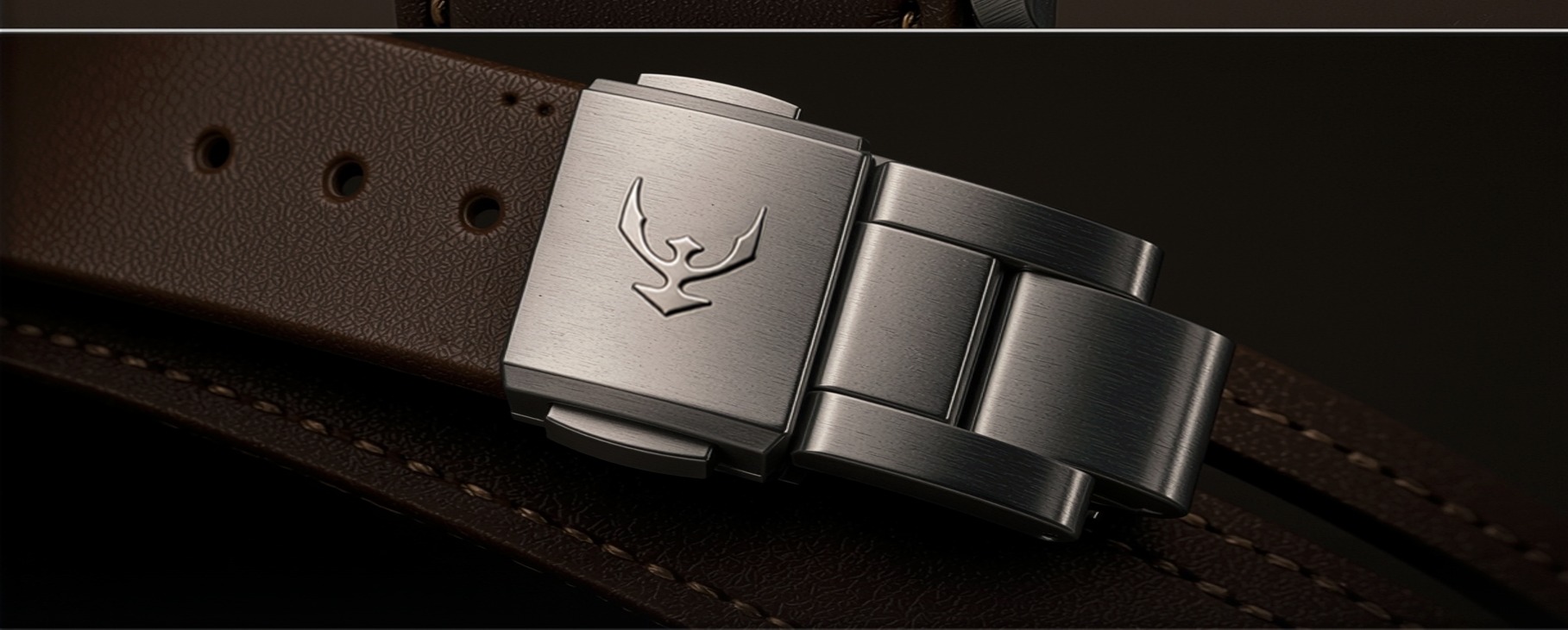 Close-up of the RONNOR steel clasp on a leather strap